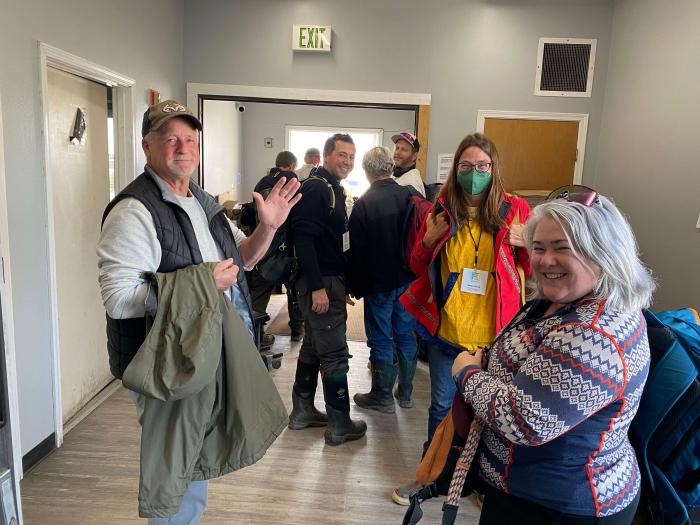 Figure 3. Bill Tracey Sr. of Point Lay (left) departs with seven other participants, including Colleen Strawhacker of the National Science Foundation (far right) and Jessica Garron (second from right) of UAF's International Arctic Research Center, on a day trip to tour his home community, which has been called Ground Zero for climate change on the North Slope. A second group flew to Wainwright with Eddie and Jimmy Kagak. Wright Air provided charter service for the Symposium. Photo courtesy of Jana Peirce. Figure 3. Bill Tracey Sr. of Point Lay (left) departs with seven other participants, including Colleen Strawhacker of the National Science Foundation (far right) and Jessica Garron (second from right) of UAF's International Arctic Research Center, on a day trip to tour his home community, which has been called Ground Zero for climate change on the North Slope. A second group flew to Wainwright with Eddie and Jimmy Kagak. Wright Air provided charter service for the Symposium. Photo courtesy of Jana Peirce.